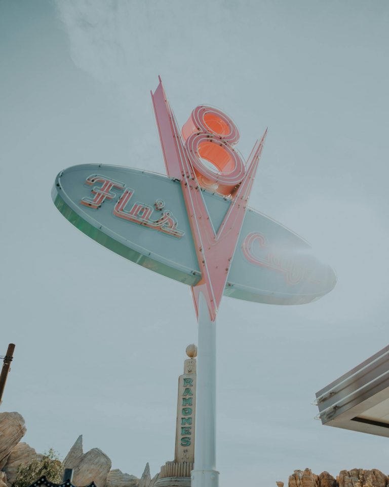 Iconic Flo's V8 Cafe sign in Disneyland, capturing a classic American diner style.