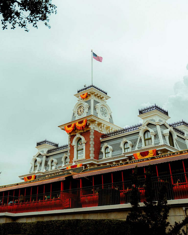 The Main Street Station adorned with fall decorations at Walt Disney World, Orlando.